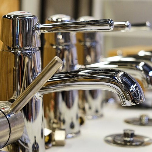 closeup of commercial faucets